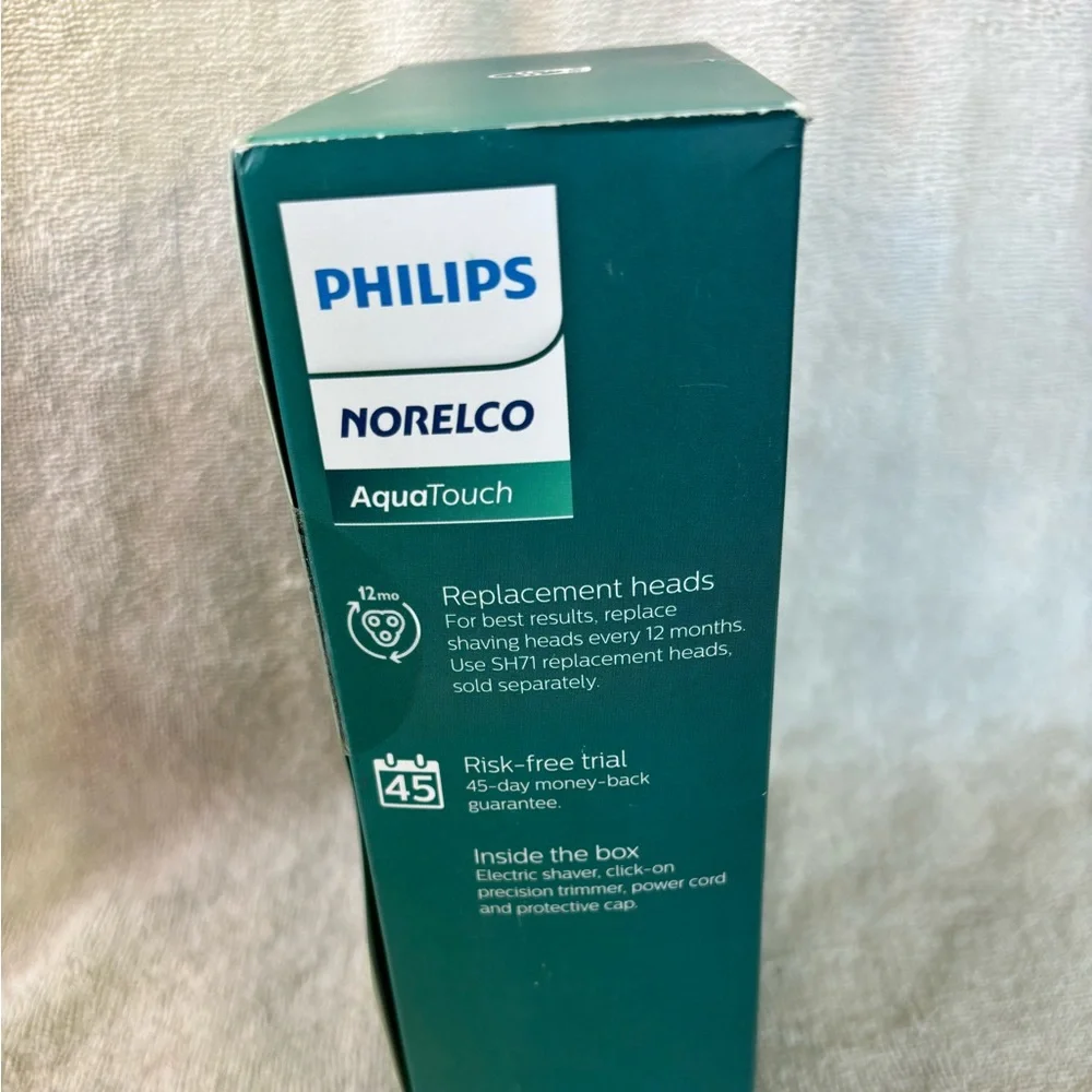 Philips Norelco Aquatouch, Rechargeable Wet & Dry Shaver with Click-On Trimmer‎